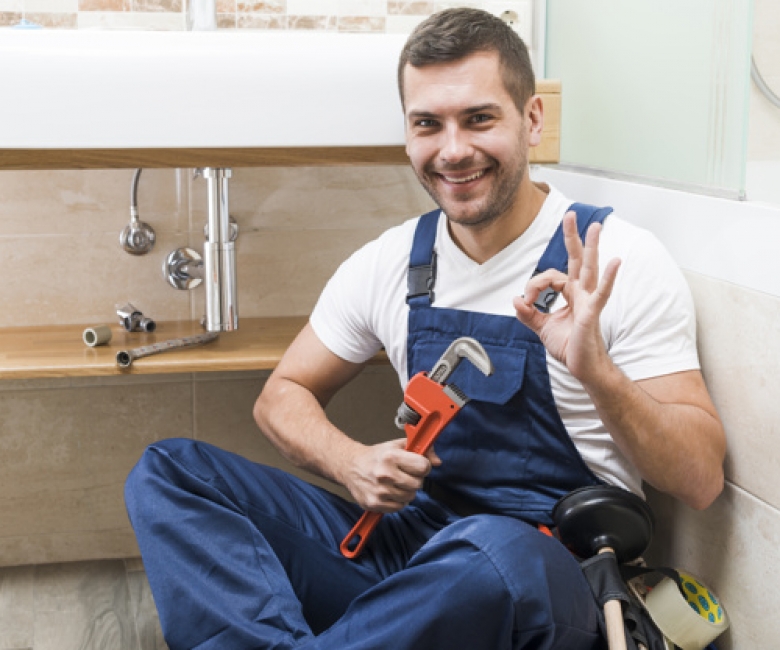 cheerful-plumber-gesturing-ok_23-2147772212